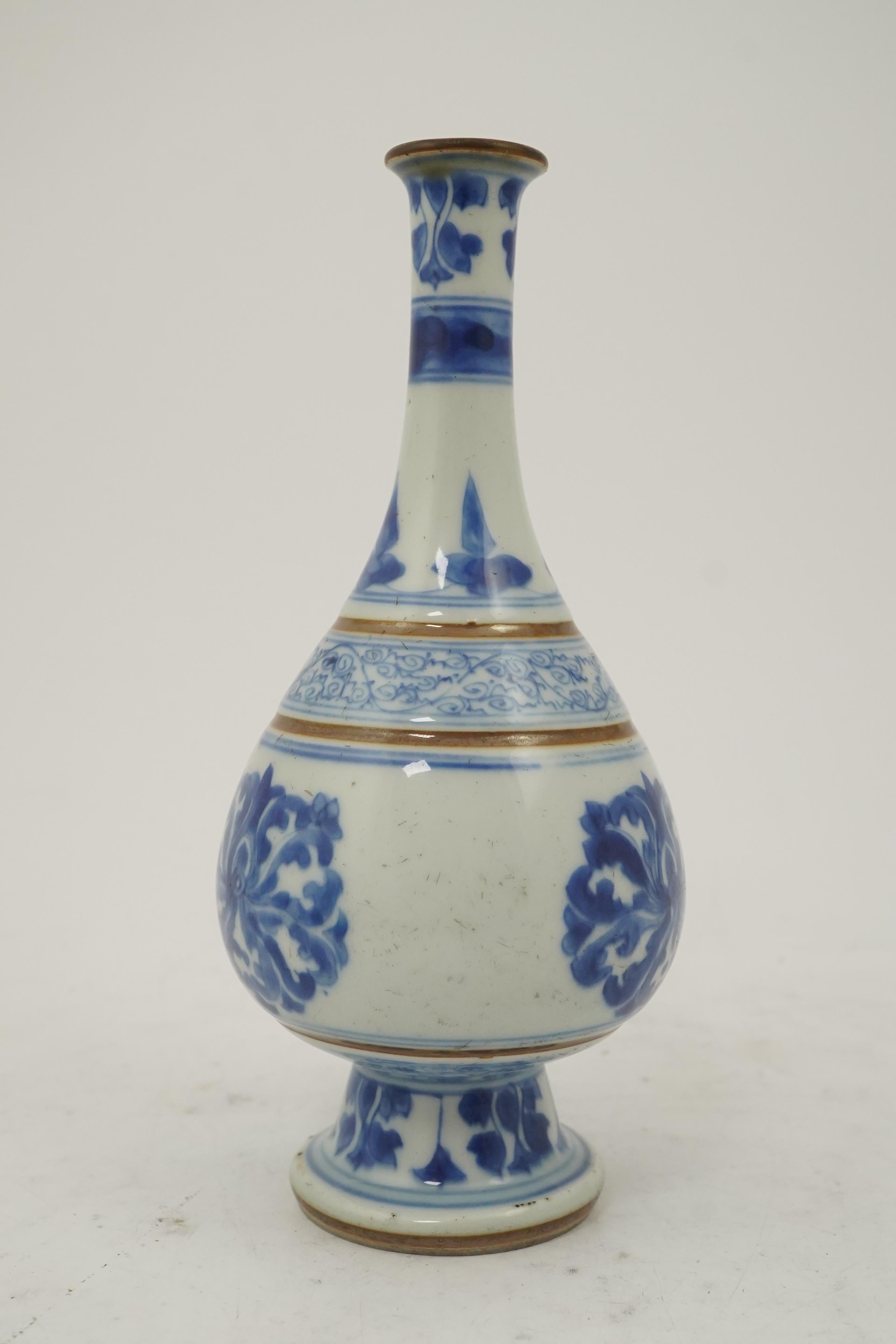 A Chinese blue and white ‘lotus’ bottle vase, Kangxi period